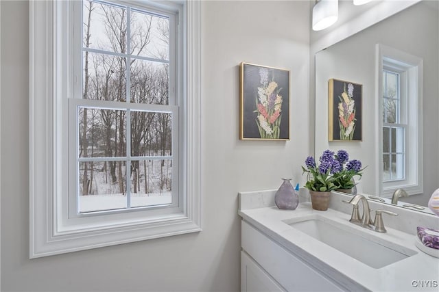 bathroom featuring vanity and a wealth of natural light