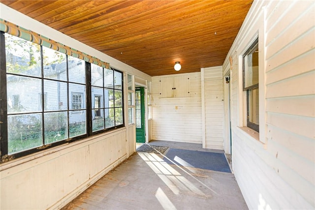 sunroom with wood ceiling