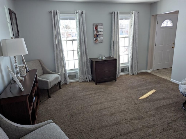 interior space featuring light colored carpet