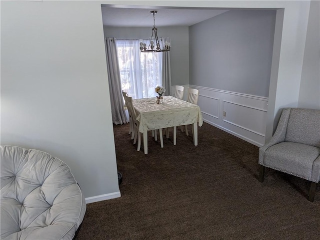 carpeted dining space featuring a notable chandelier