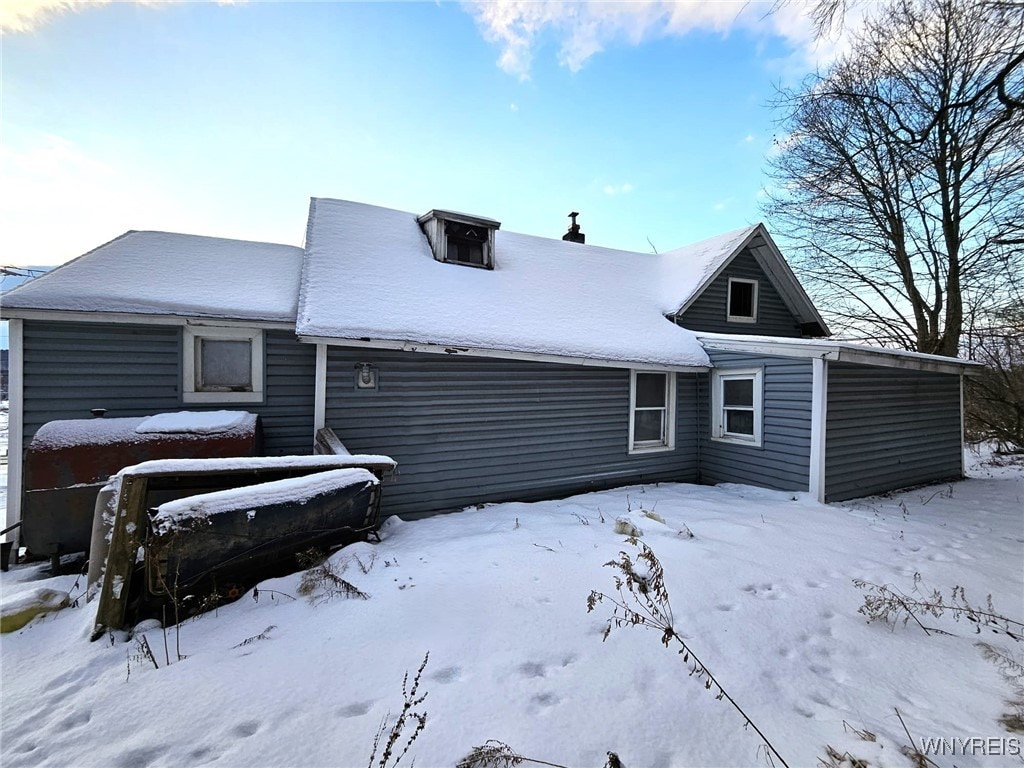 view of snow covered property