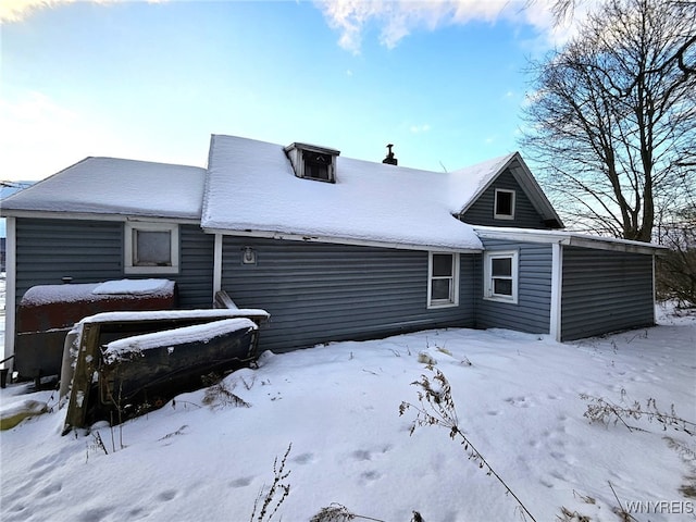 view of snow covered property