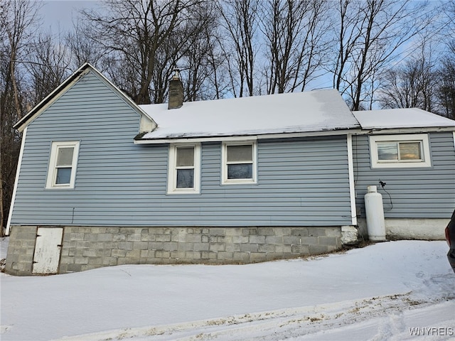 view of snow covered property