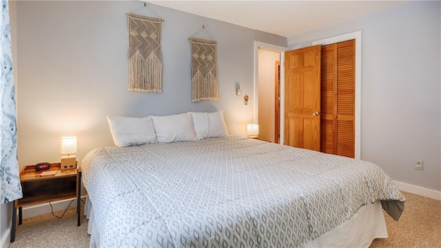 bedroom featuring a closet and carpet