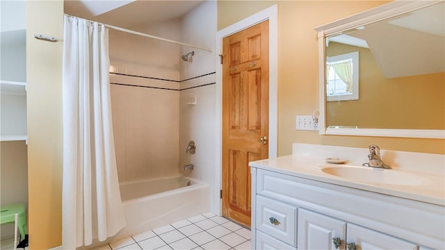 bathroom featuring shower / bath combo, lofted ceiling, tile patterned floors, and vanity