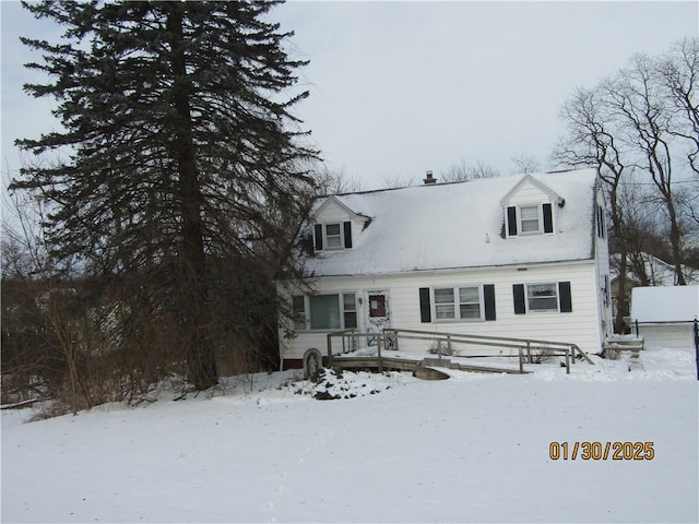 view of front of home with a wooden deck