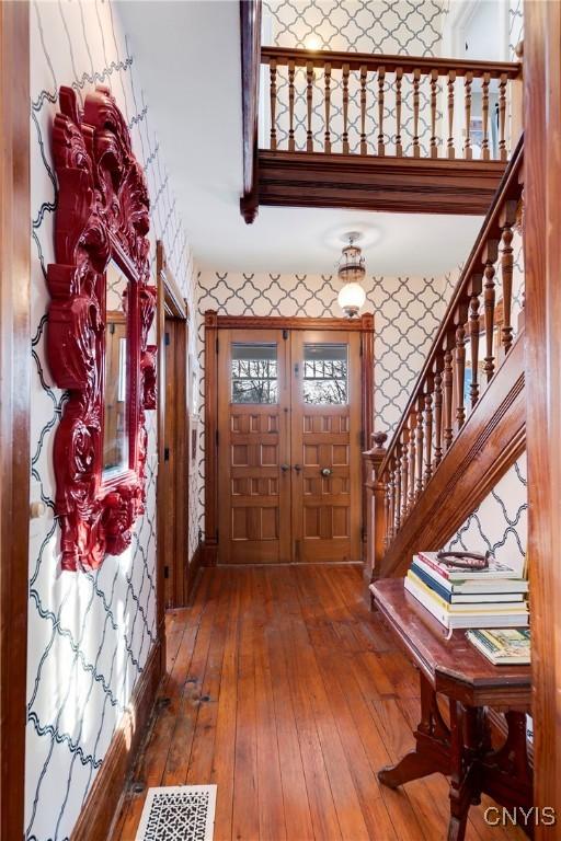 foyer with wood-type flooring