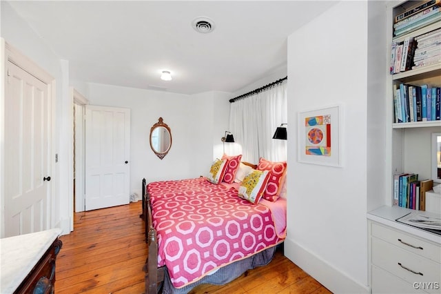 bedroom featuring light wood-type flooring