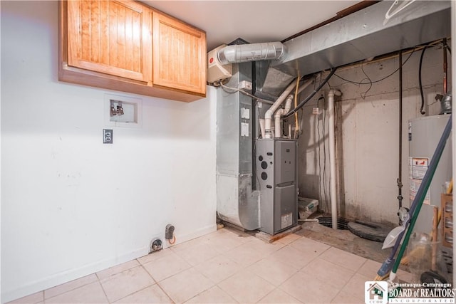 utility room with heating unit and gas water heater