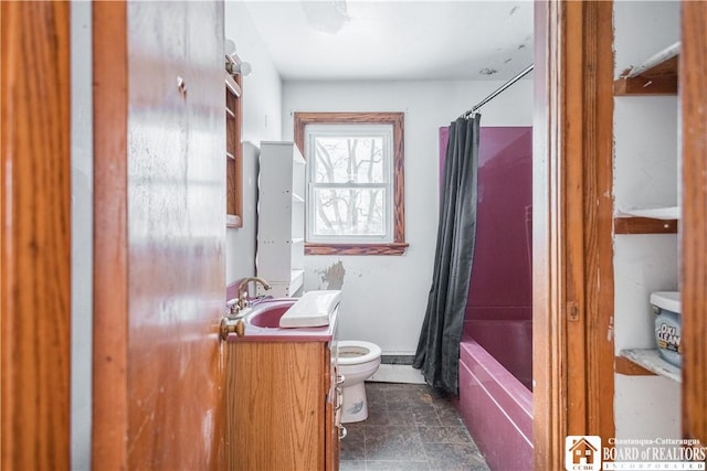 full bathroom with vanity, toilet, and shower / bath combo with shower curtain