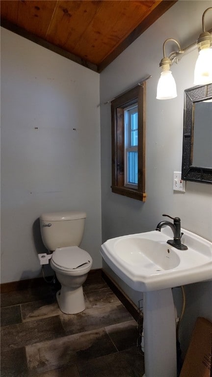 bathroom featuring wood ceiling, toilet, and vaulted ceiling