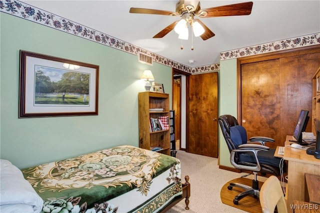 bedroom with ceiling fan and carpet flooring