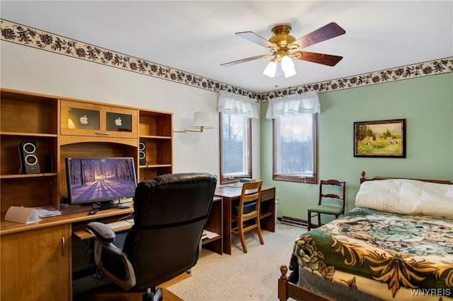 bedroom with ceiling fan and light colored carpet