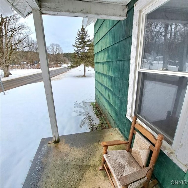 view of snow covered patio