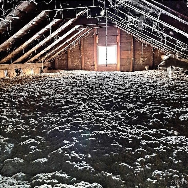 view of unfinished attic