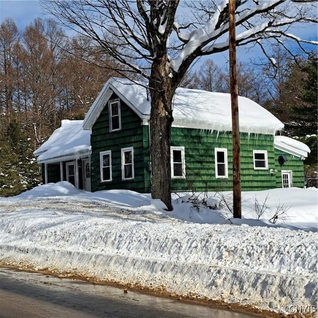 view of snow covered property