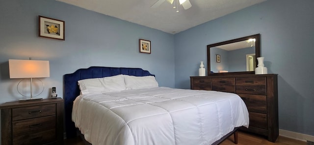 bedroom featuring wood-type flooring and ceiling fan