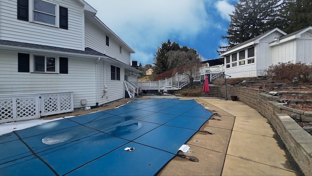 view of pool with a deck