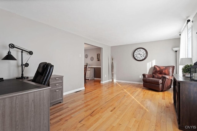 office space featuring light hardwood / wood-style floors