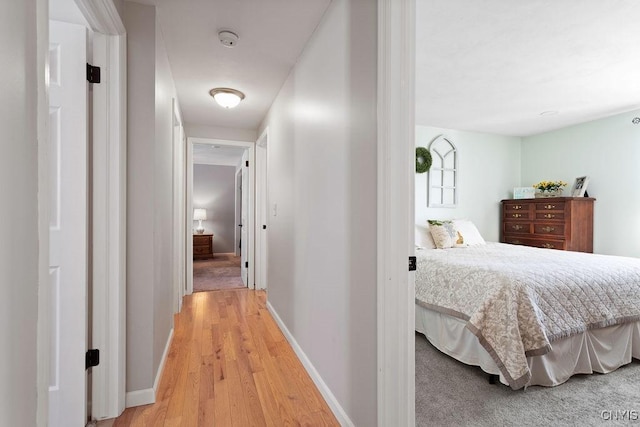 bedroom with wood-type flooring