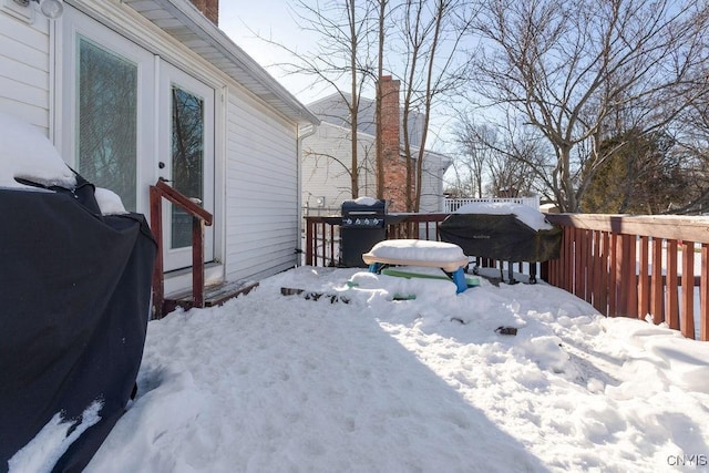 view of yard covered in snow