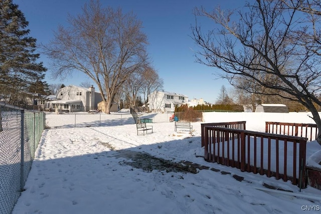 view of yard covered in snow