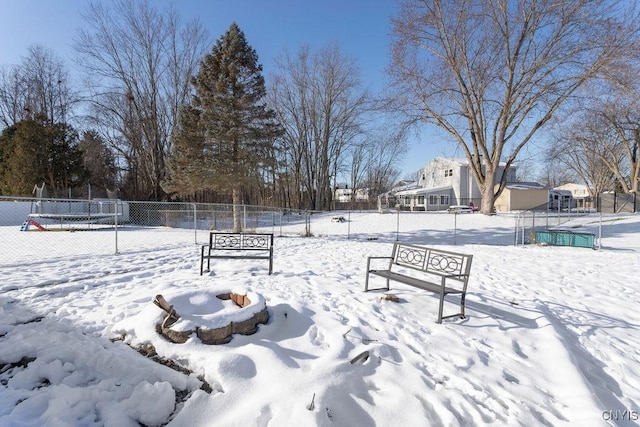 view of yard covered in snow