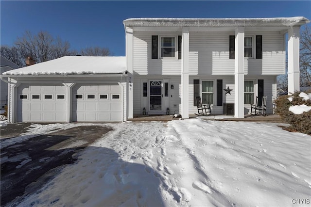 view of front of home with a garage