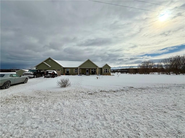 view of snow covered property