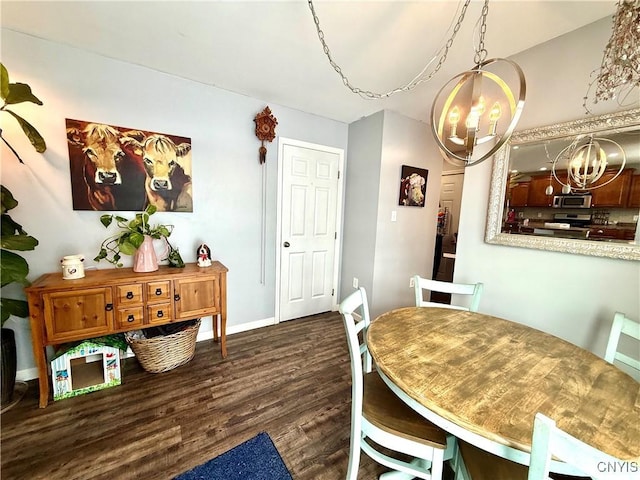 dining space with dark hardwood / wood-style floors