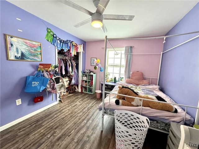 bedroom featuring ceiling fan and wood-type flooring