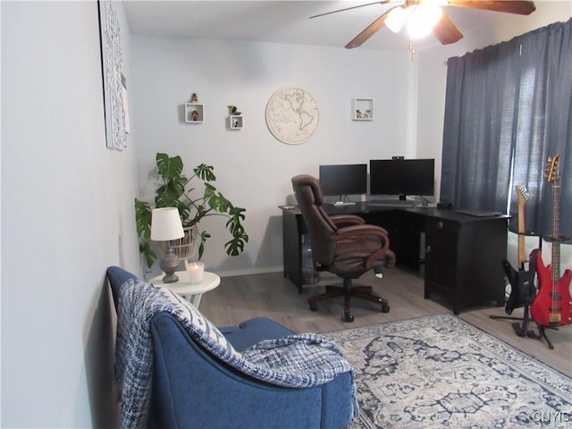 office space with hardwood / wood-style flooring and ceiling fan