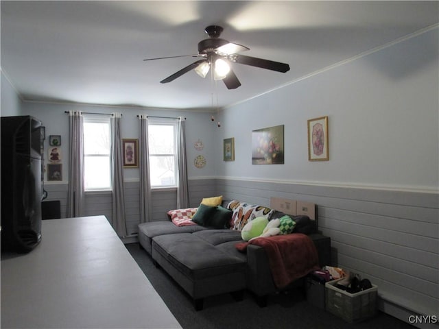 bedroom with crown molding and ceiling fan