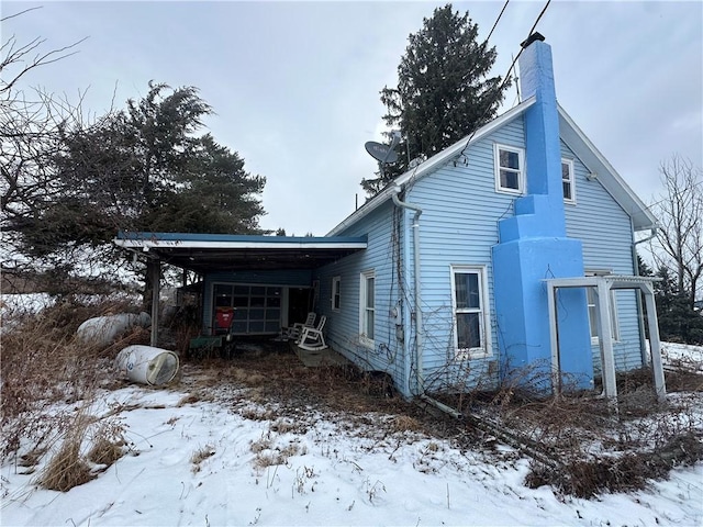 view of snow covered property