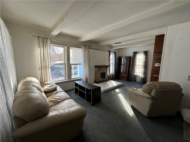 living room with carpet flooring, a fireplace, and beam ceiling