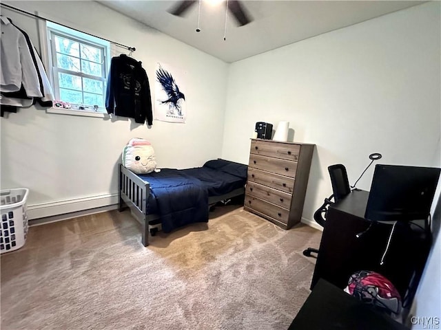 bedroom featuring a baseboard radiator, ceiling fan, and carpet flooring