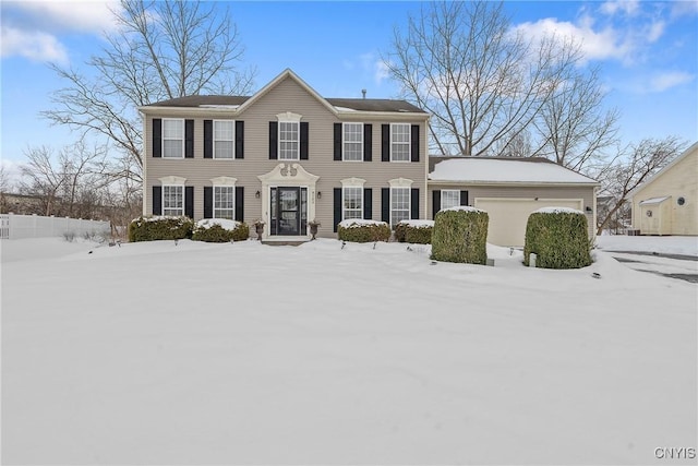 colonial-style house with a garage