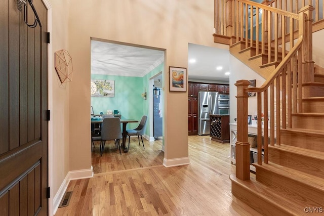 entrance foyer featuring light wood-type flooring