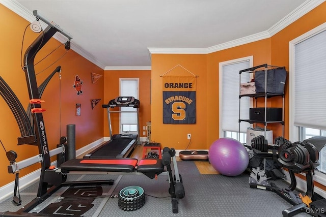 exercise room with ornamental molding