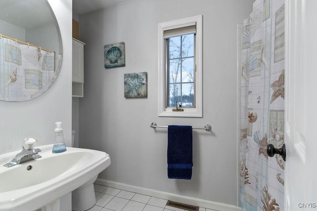 bathroom featuring sink and tile patterned floors