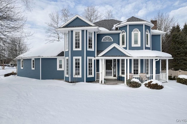 view of front of property featuring covered porch