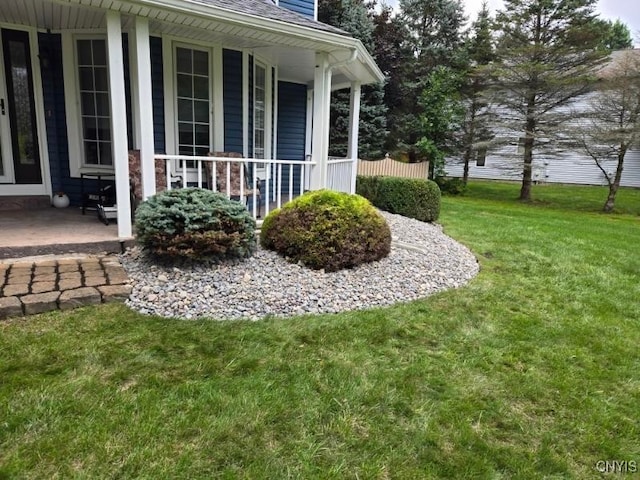 view of yard with a porch