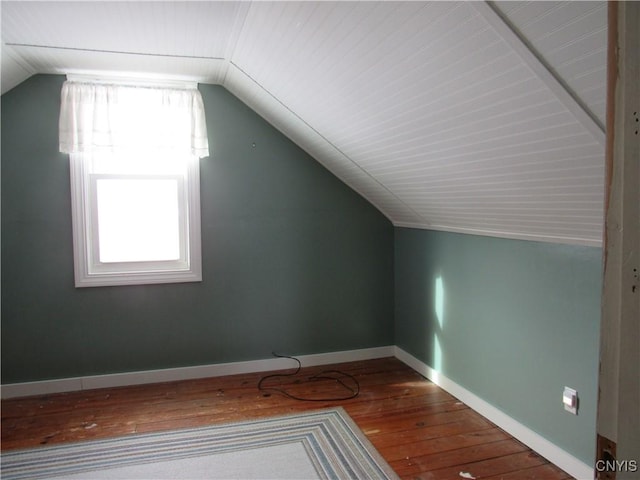 bonus room featuring lofted ceiling and wood-type flooring