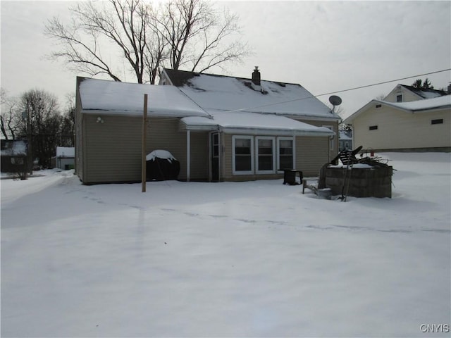 view of snow covered property