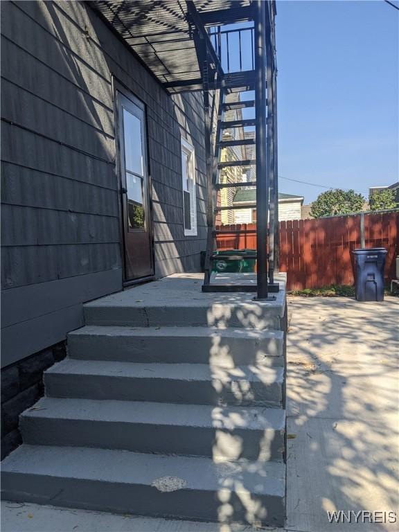 entrance to property with a patio