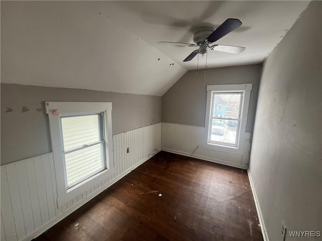 bonus room featuring vaulted ceiling, dark hardwood / wood-style floors, and ceiling fan