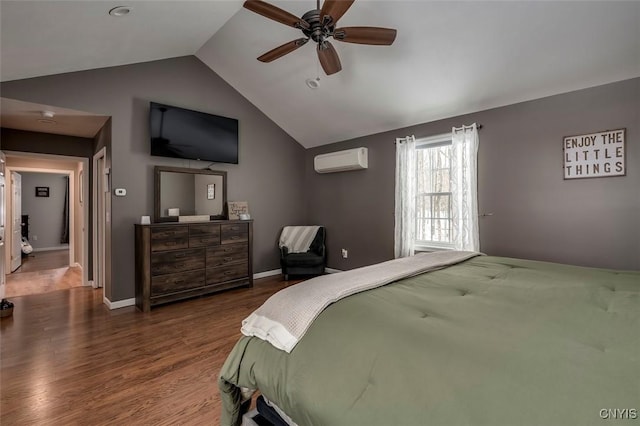 bedroom featuring hardwood / wood-style flooring, lofted ceiling, a wall mounted air conditioner, and ceiling fan