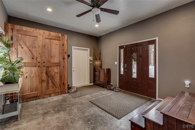 entrance foyer featuring ceiling fan