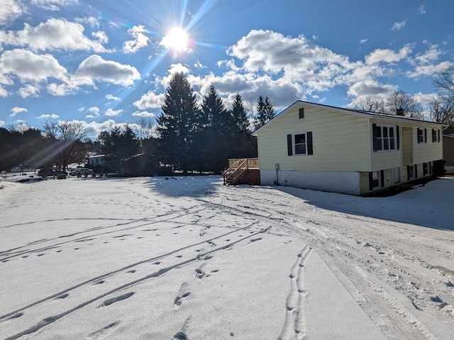 view of snow covered property