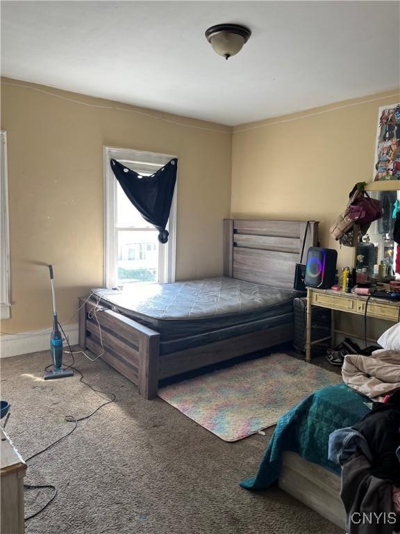 bedroom featuring carpet flooring